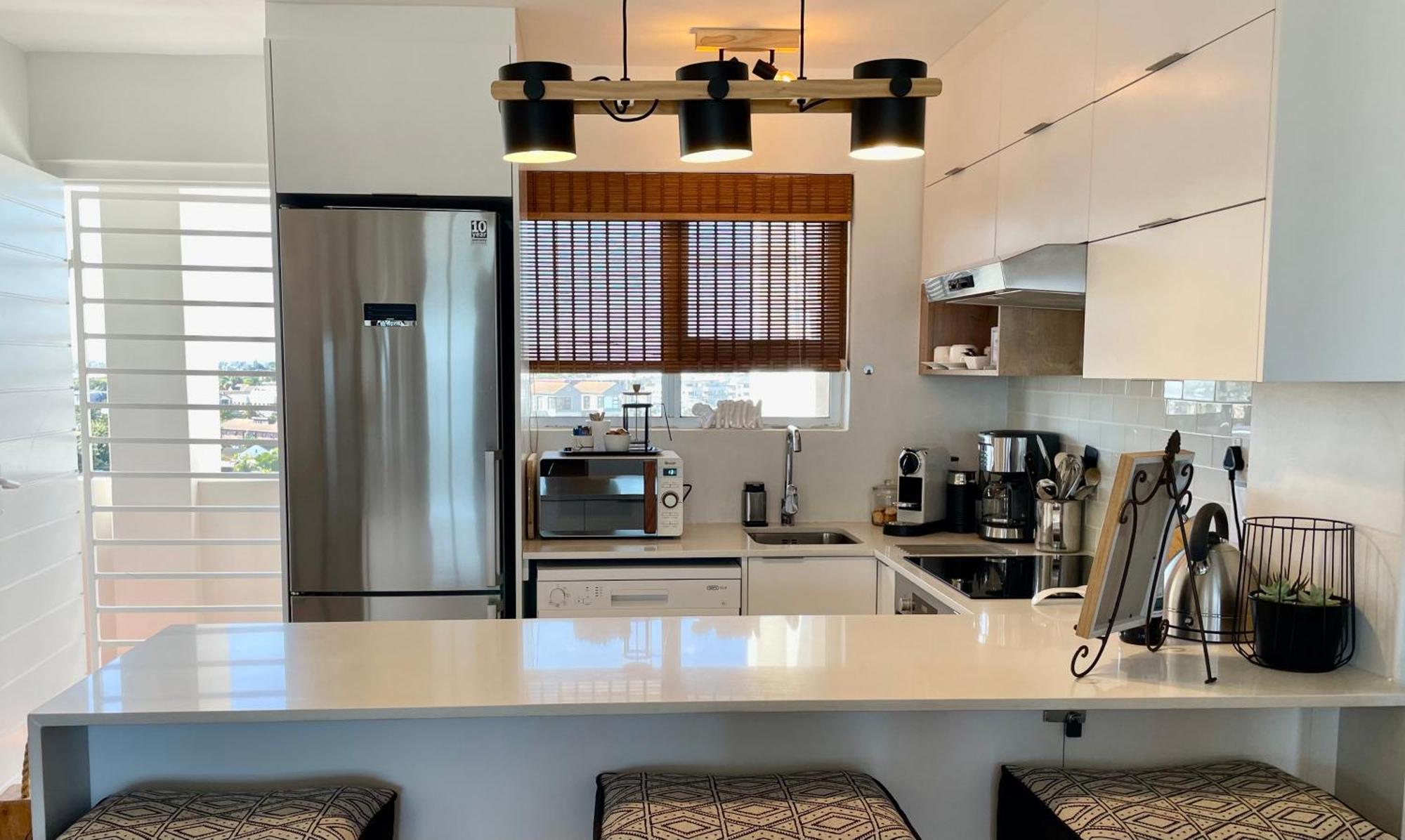 Abode Africa Apartment Bloubergstrand Bagian luar foto